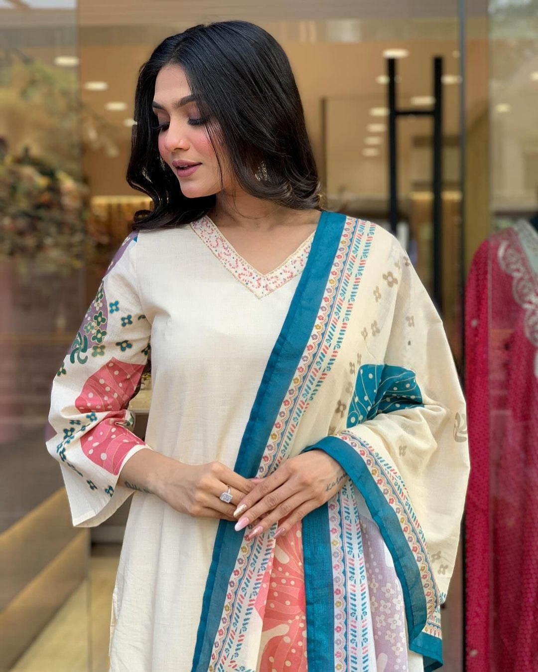 Launching Summer Cool, Comfortable And Attractive Softest Muslin Suit Set Which Is Beautifully Decorated With Hand Embroidery And Thread Work. It Is Paired With Matching Pants And Dupatta(SWRED18)