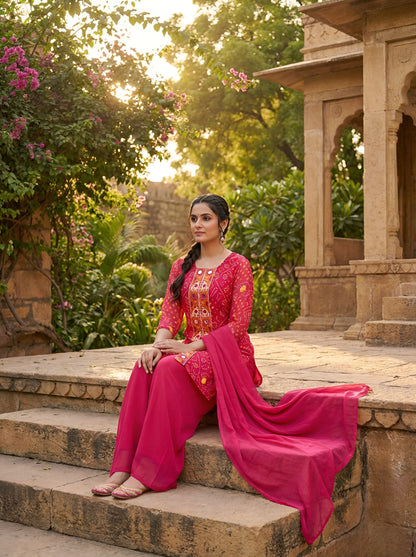 A Rich Purple And Pink Bandhani Printed Plazo set Featuring An Embroidered Front Panel, Flowy Matching Bottoms and A Sheer Dupatta For An Elegant Ethnic Look. (NFRD01)