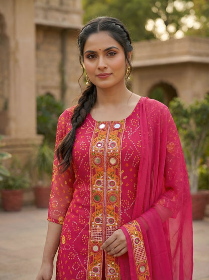 A Rich Purple And Pink Bandhani Printed Plazo set Featuring An Embroidered Front Panel, Flowy Matching Bottoms and A Sheer Dupatta For An Elegant Ethnic Look. (NFRD01)