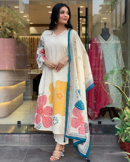 Launching Summer Cool, Comfortable And Attractive Softest Muslin Suit Set Which Is Beautifully Decorated With Hand Embroidery And Thread Work. It Is Paired With Matching Pants And Dupatta(WARED17)