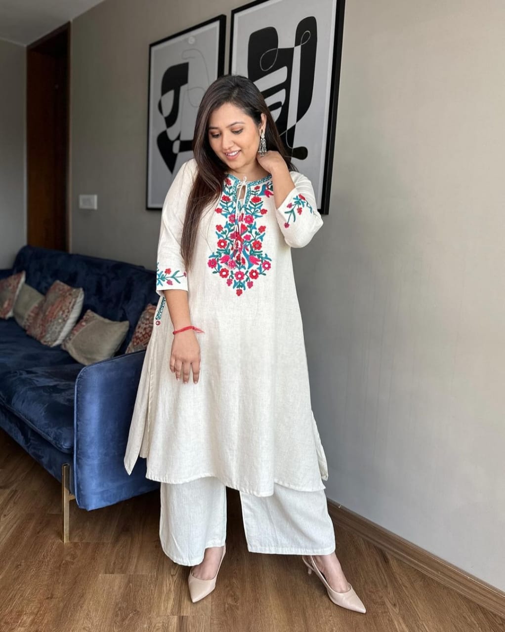 Get your hands on our beautiful off-white kurti with intricate thread aari work detailing in bright tone perfect for any auspicious occasion. (SWSK27)