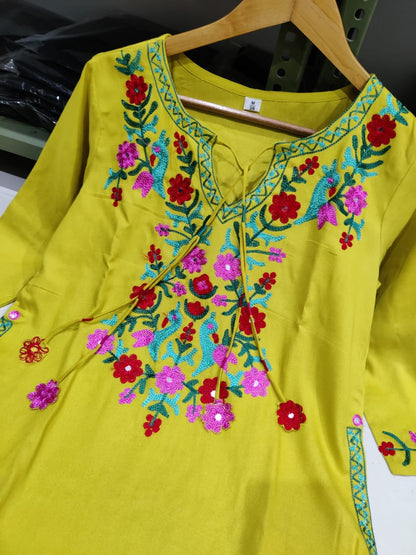 Get your hands on our beautiful off-white kurti with intricate thread aari work detailing in bright tone perfect for any auspicious occasion. (SWSK27)